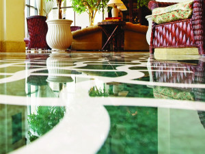 Green and white polished marble floor
